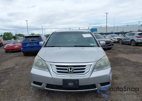 2010 Honda Odyssey Ex z USA, uszkodzony, nr VIN 5FNRL3H44AB101312